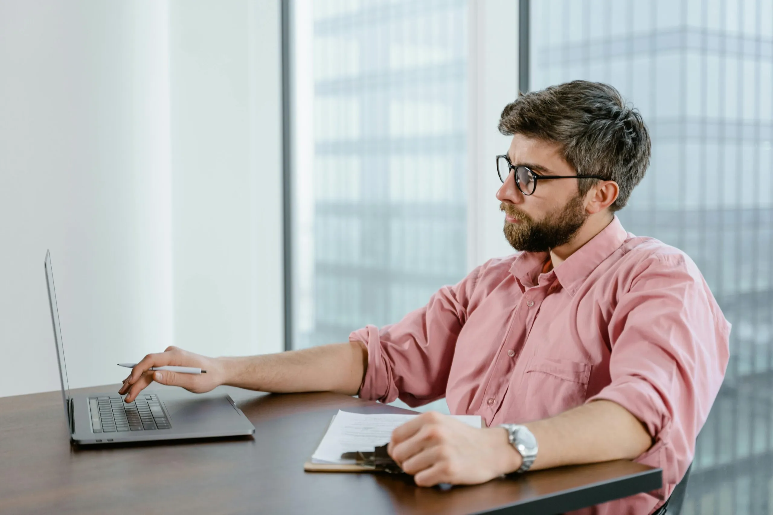 Virtual assistant at a desk with laptop, representing Timber Creek Virtual’s focus on technical readiness for efficient and reliable business support.